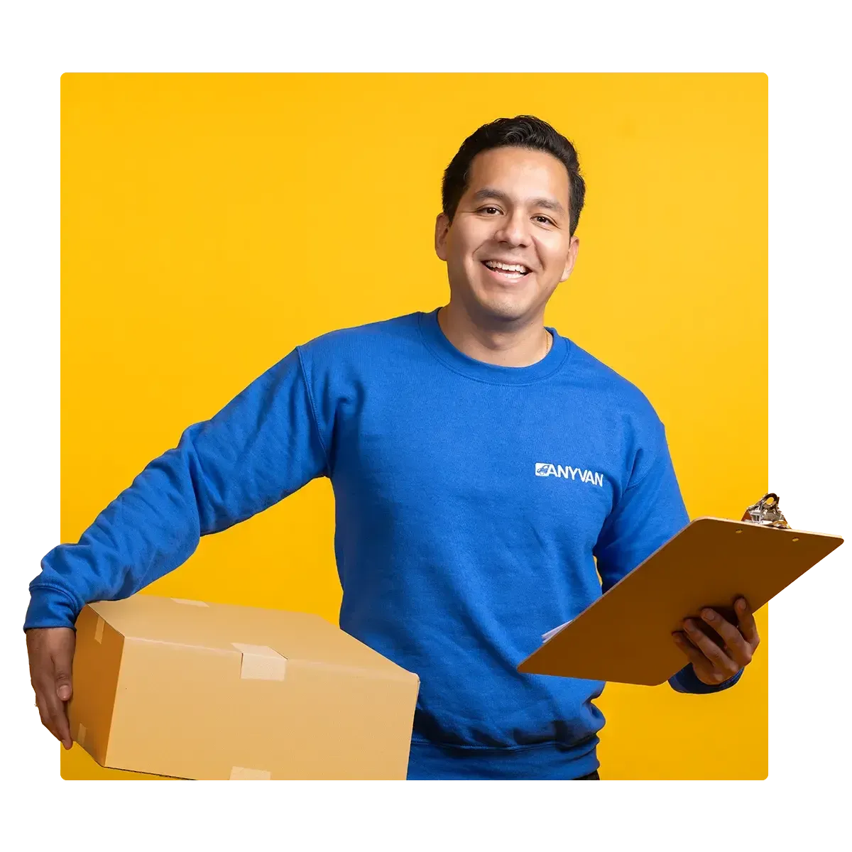 Delivery man offering good customer service with box and clipboard
