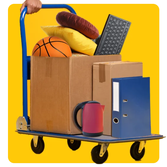 Image of student removals represented by a trolley with boxes of student home items