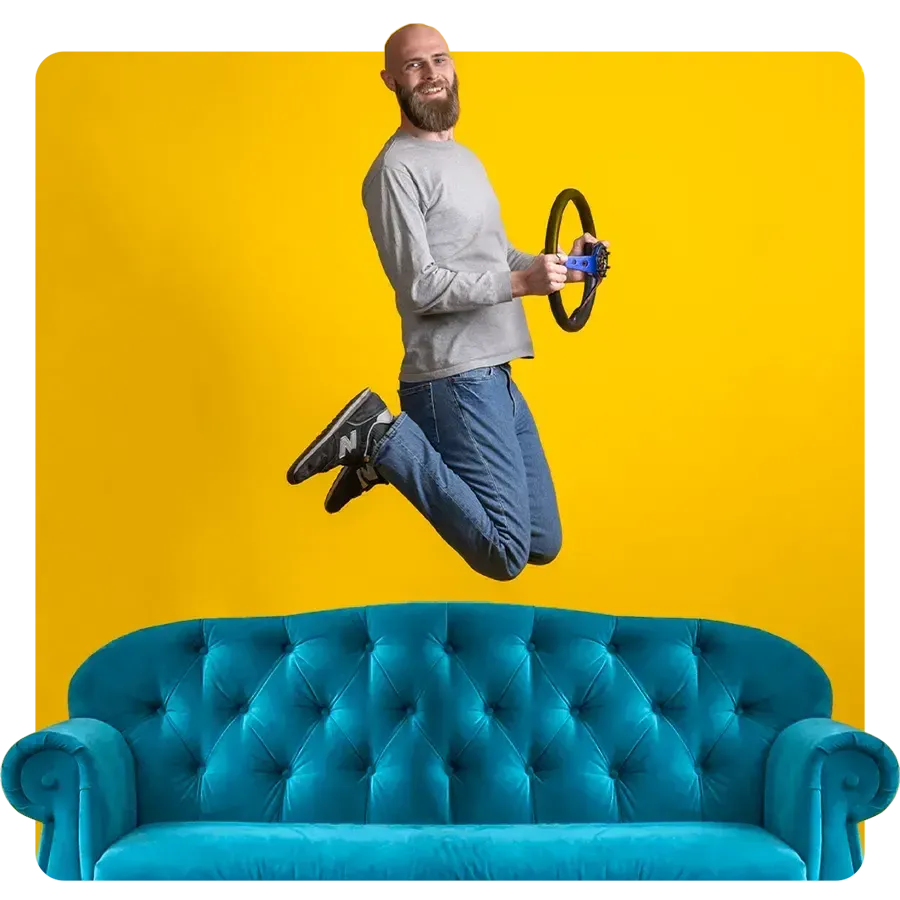 Removals expert jumping on a large sofa
