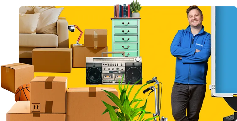 Image of a removal man next to a van, a variety of different items to move are next to him 